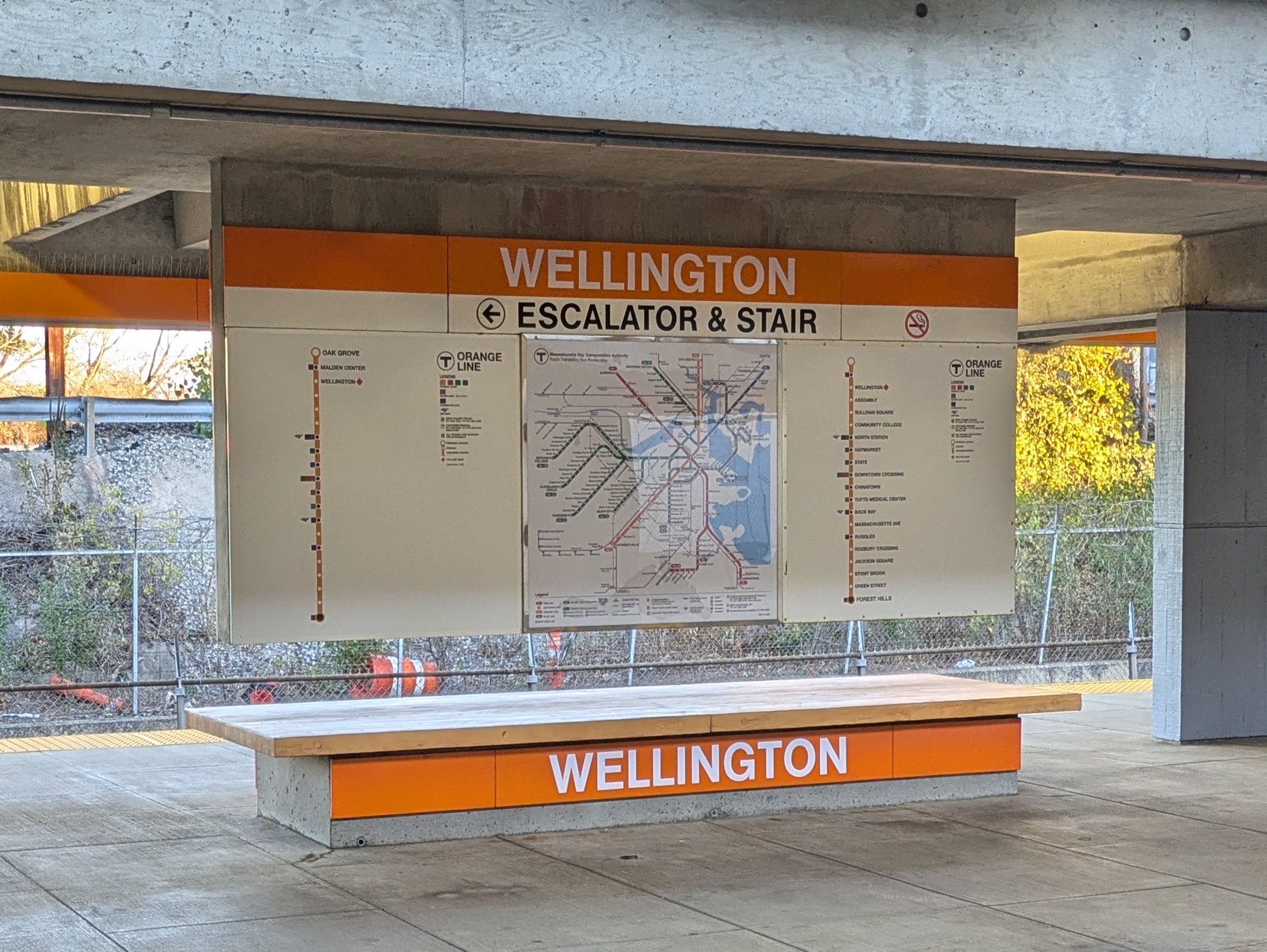 A bench in a subway station.